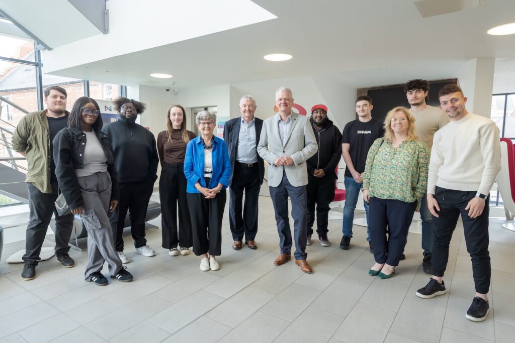 Sue and Mike Clasper with University of Sunderland Vice-Chancellor, Sir David Bell, and some of the many Sunderland students the Claspers have supported