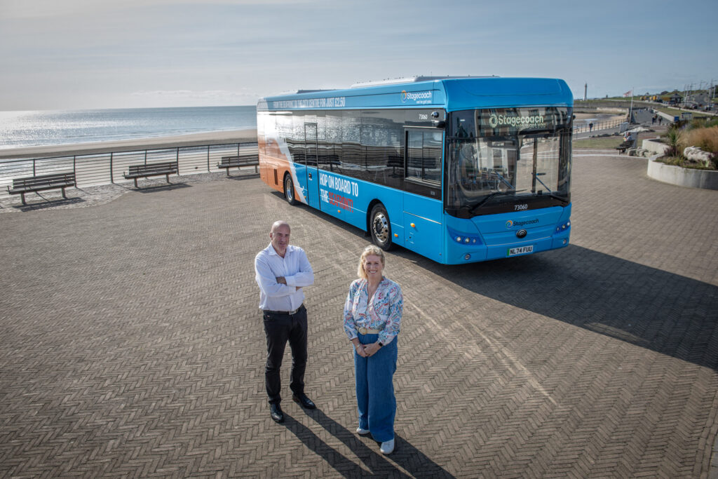 Steve Walker and Sharon Appleby with the new-look coastal route bus on Sunderland seafront.