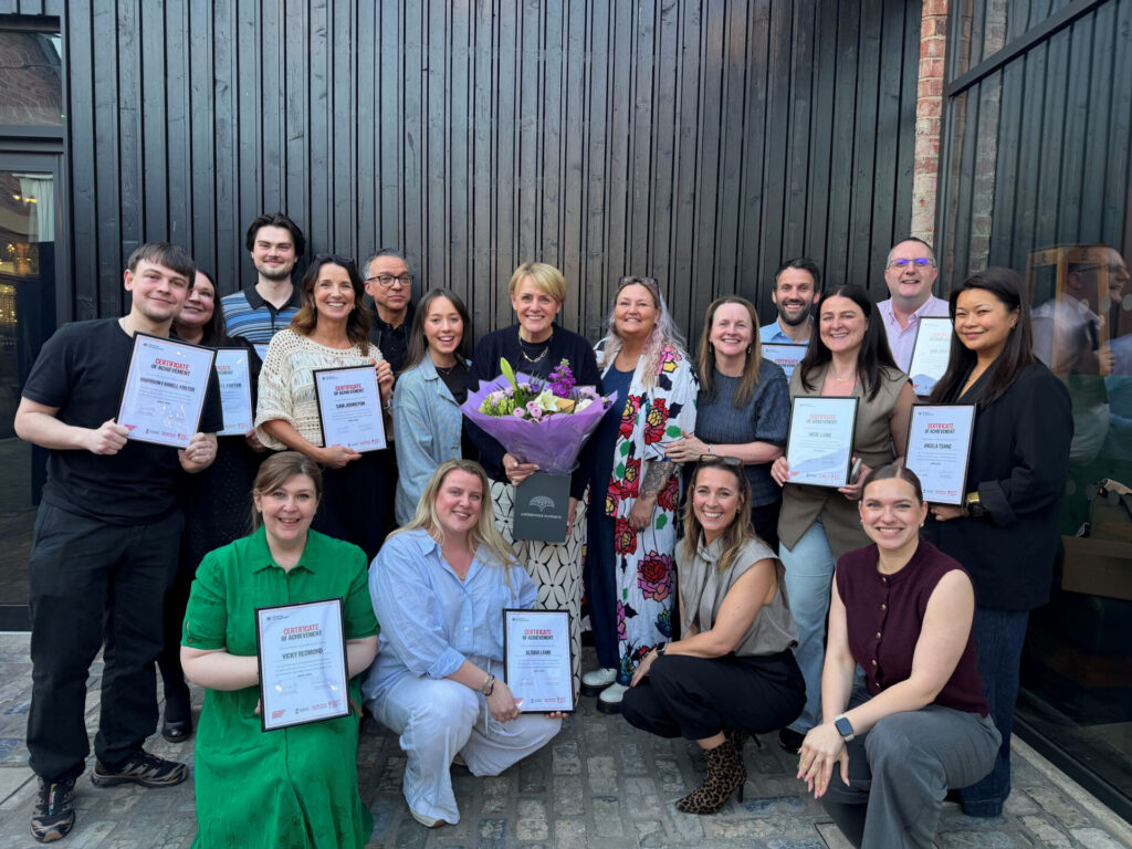 the first “graduates” from the Sunderland Foundational Businesses Academy with (centre, holding flowers) retail expert and course leader, Karen Williamson.