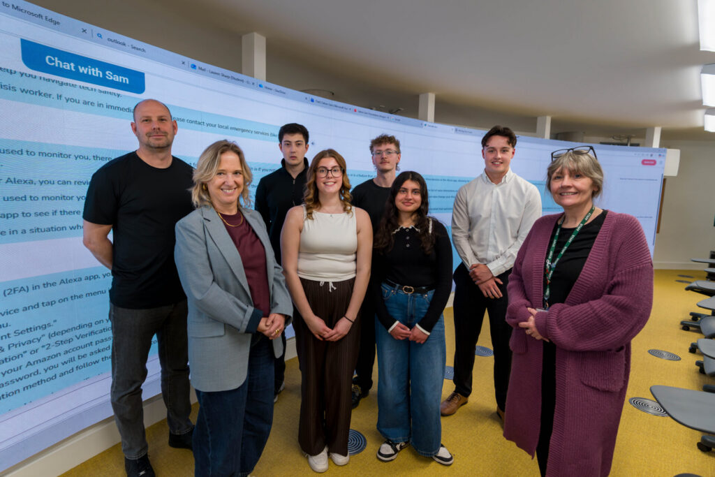 (L-R) Paul Graham, Senior Lecturer in Computer Science at the University, Laura Seebohm, CEO of WWIN, Jacob McLaughlin, Lauren Sharp, Jonny Rayner, Zoya Rind, Josh Brown, Karin McMullan, IT and Data Manager at WWIN